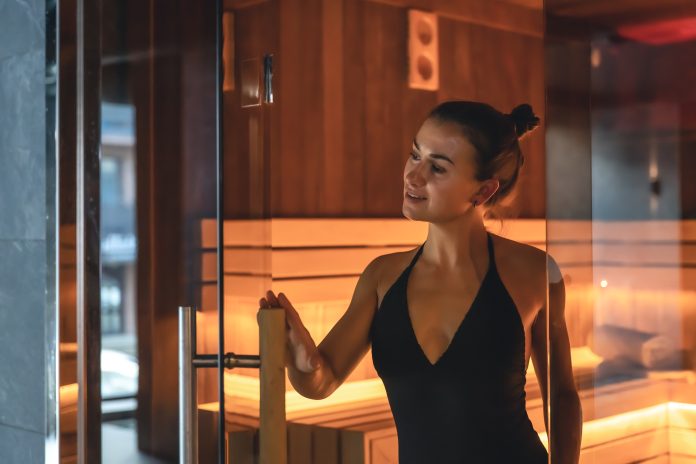 Elegant Entrances: Glass vs. Wood Sauna Doors